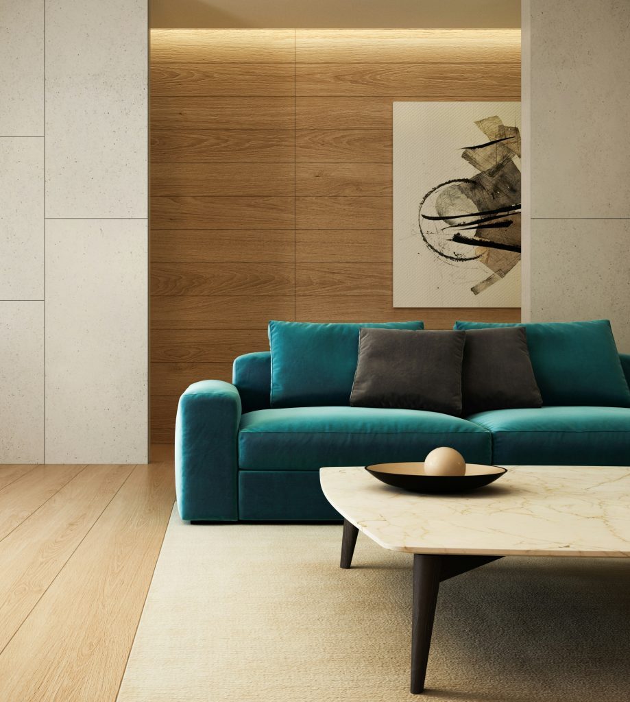 canapé en tissu bleu canard dans un intérieur design